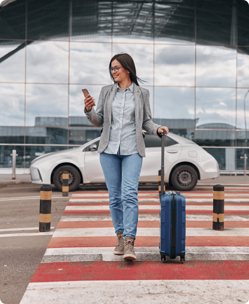 Woman Traveller In Airport Terminal